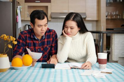 Couple counting expenses